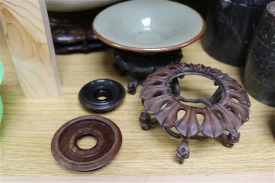 Three Chinese hardwood stands and three bowls